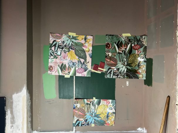 A mood board of green paint & wallpaper